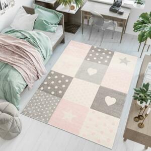 Ružový koberec so vzormi